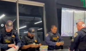 Jungle Boys Raided by LAPD and CDTFA - Authorities counting money